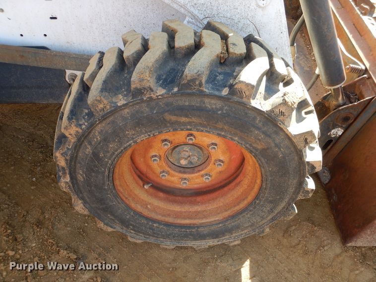 image for item ES9555 1999 Bobcat 873  skid steer loader