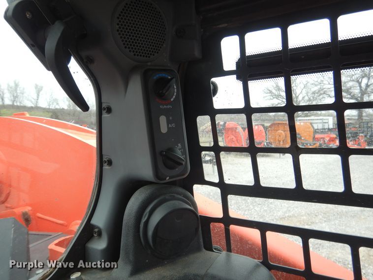 image for item ES9595 2016 Kubota SSV75  skid steer loader