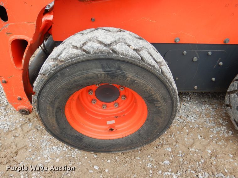 image for item ES9595 2016 Kubota SSV75  skid steer loader