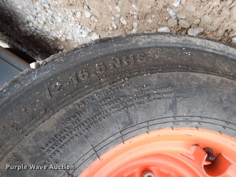 image for item ES9595 2016 Kubota SSV75  skid steer loader