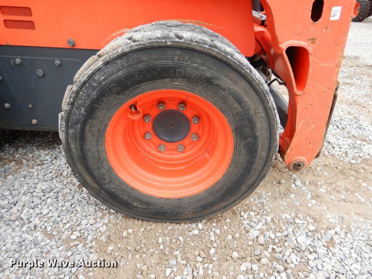 image for item ES9595 2016 Kubota SSV75  skid steer loader
