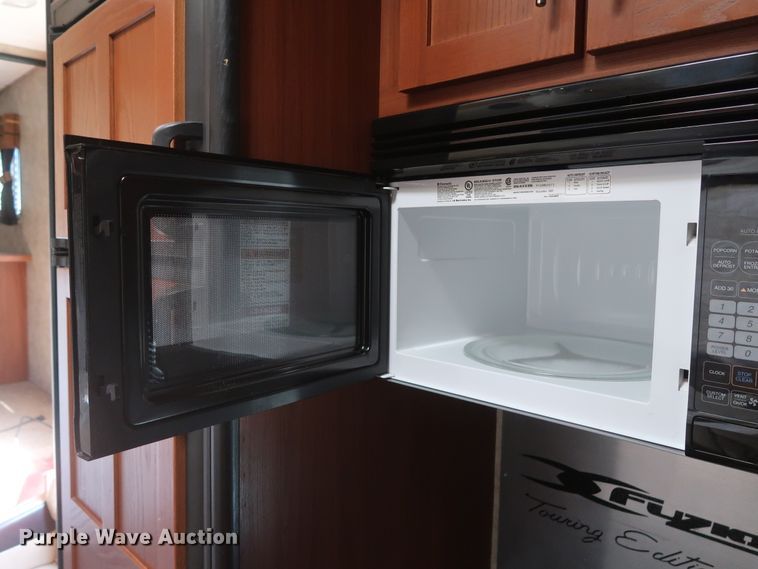 image for item DG7138 2010 Keystone FZ32210 Fuzion Touring Edition II camper