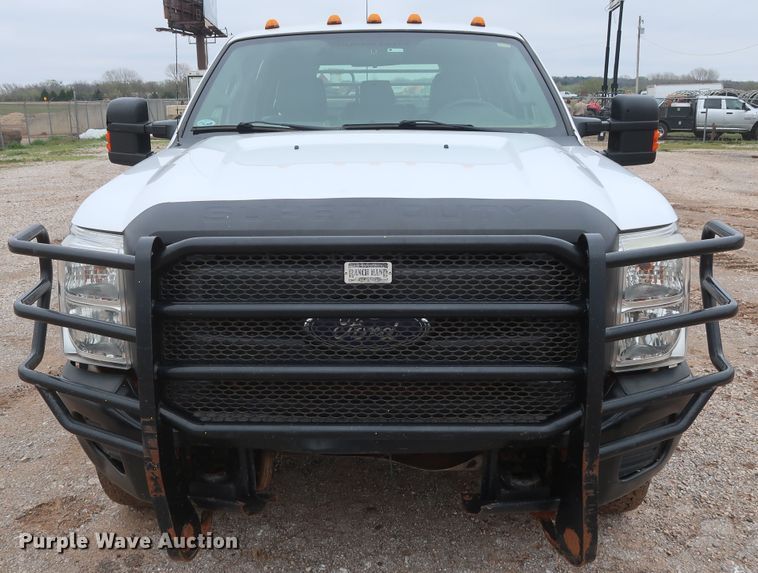 image for item DG7152 2014 Ford F350 Super Duty XLT  Crew Cab flatbed pickup truck