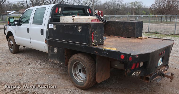 image for item DG7152 2014 Ford F350 Super Duty XLT  Crew Cab flatbed pickup truck