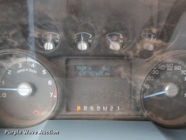 image for item DG7152 2014 Ford F350 Super Duty XLT  Crew Cab flatbed pickup truck