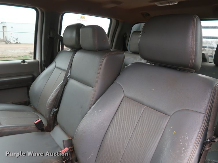 image for item DG7152 2014 Ford F350 Super Duty XLT  Crew Cab flatbed pickup truck