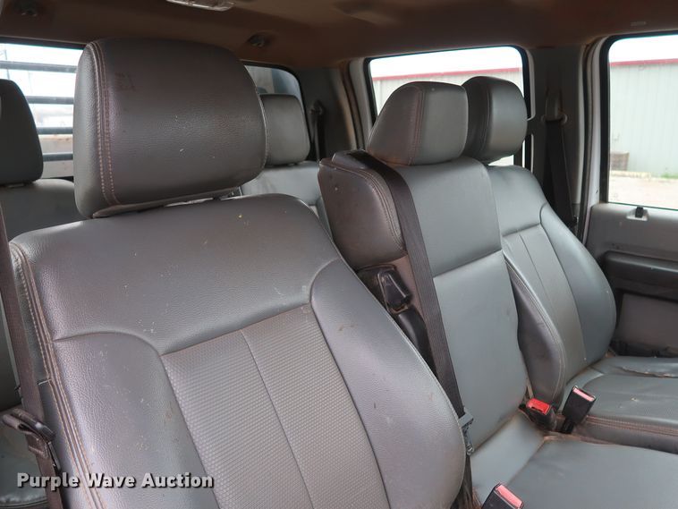 image for item DG7152 2014 Ford F350 Super Duty XLT  Crew Cab flatbed pickup truck