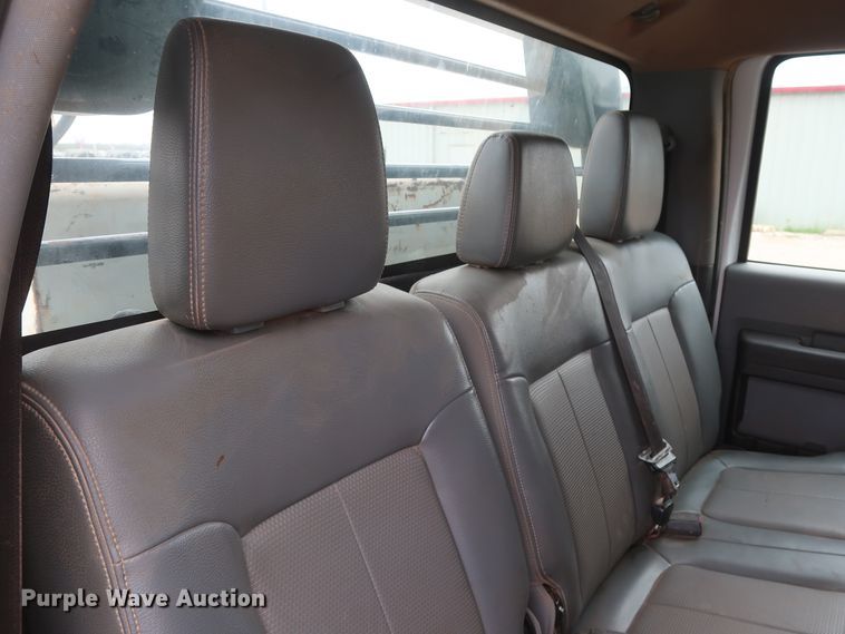 image for item DG7152 2014 Ford F350 Super Duty XLT  Crew Cab flatbed pickup truck