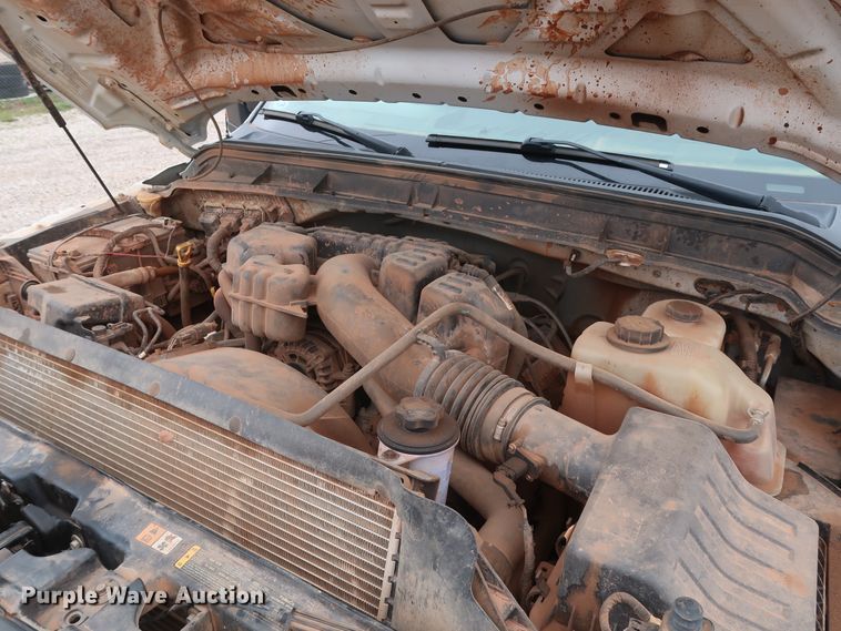 image for item DG7152 2014 Ford F350 Super Duty XLT  Crew Cab flatbed pickup truck