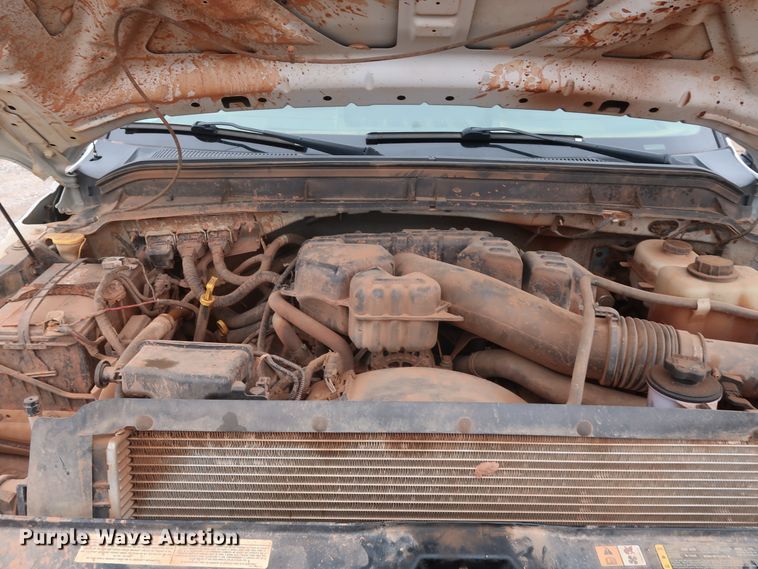 image for item DG7152 2014 Ford F350 Super Duty XLT  Crew Cab flatbed pickup truck