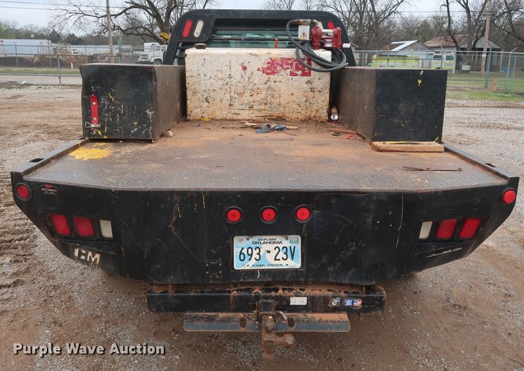 image for item DG7152 2014 Ford F350 Super Duty XLT  Crew Cab flatbed pickup truck