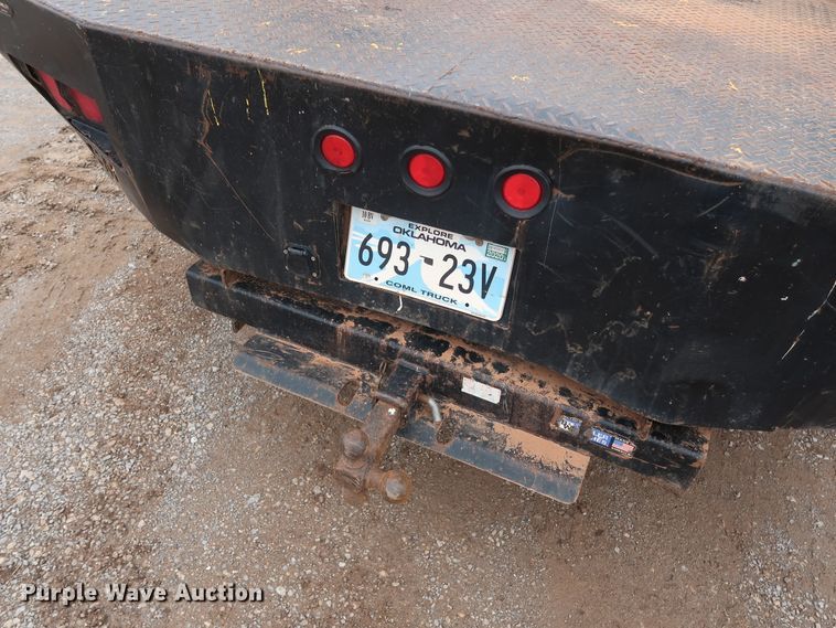 image for item DG7152 2014 Ford F350 Super Duty XLT  Crew Cab flatbed pickup truck