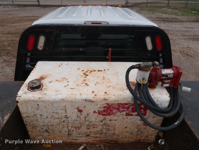 image for item DG7152 2014 Ford F350 Super Duty XLT  Crew Cab flatbed pickup truck