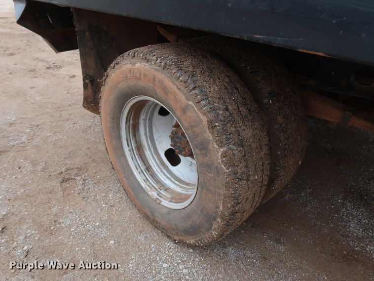 image for item DG7152 2014 Ford F350 Super Duty XLT  Crew Cab flatbed pickup truck