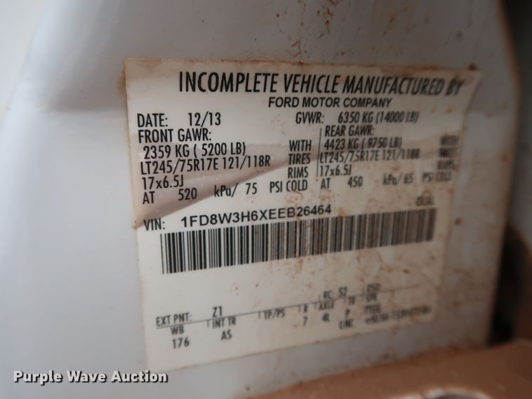 image for item DG7152 2014 Ford F350 Super Duty XLT  Crew Cab flatbed pickup truck