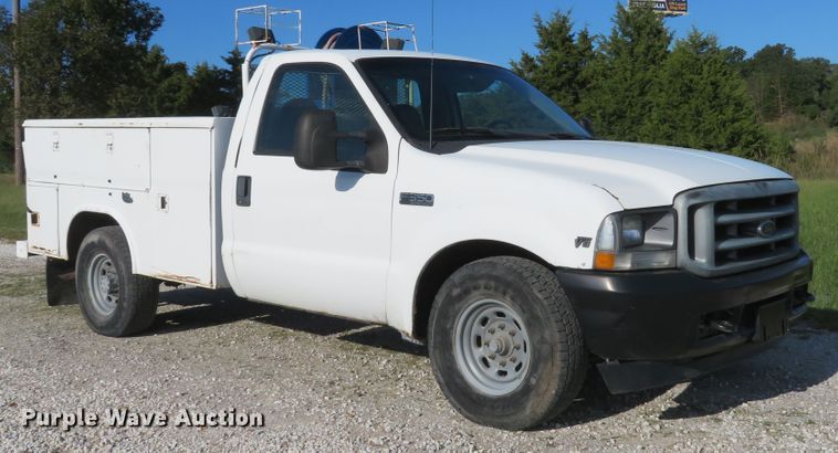 image for item DH1599 2002 Ford F350 Super Duty XL utility bed pickup truck