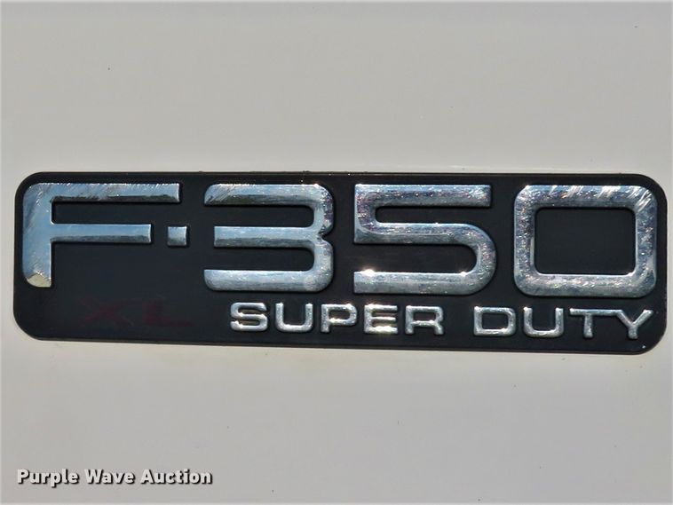 image for item DH1599 2002 Ford F350 Super Duty XL utility bed pickup truck