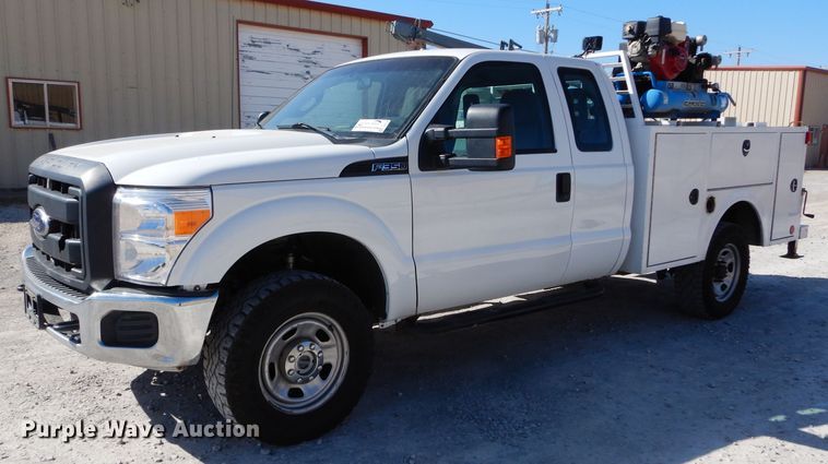 image for item DH3736 2015 Ford F350 Super Duty  SuperCab utility bed pickup truck