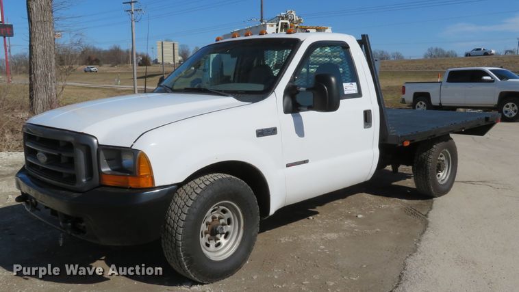 image for item DI2070 2000 Ford F350 Super Duty XL  flatbed pickup truck