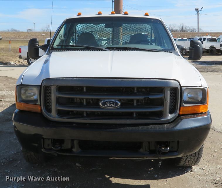 image for item DI2070 2000 Ford F350 Super Duty XL  flatbed pickup truck