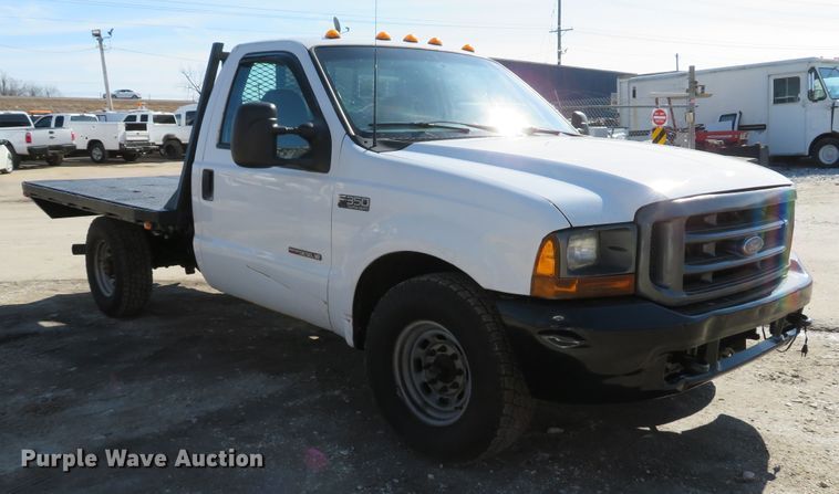 image for item DI2070 2000 Ford F350 Super Duty XL  flatbed pickup truck