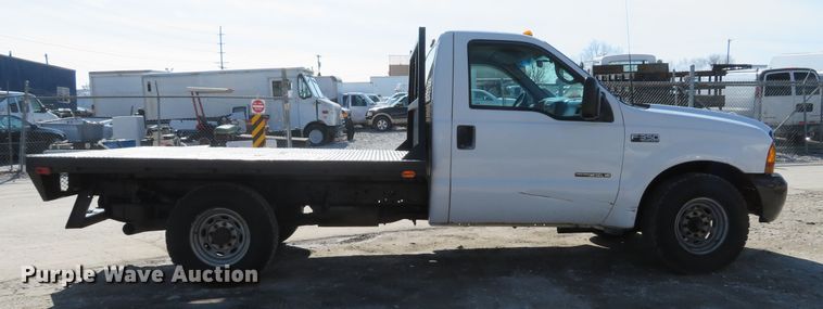 image for item DI2070 2000 Ford F350 Super Duty XL  flatbed pickup truck