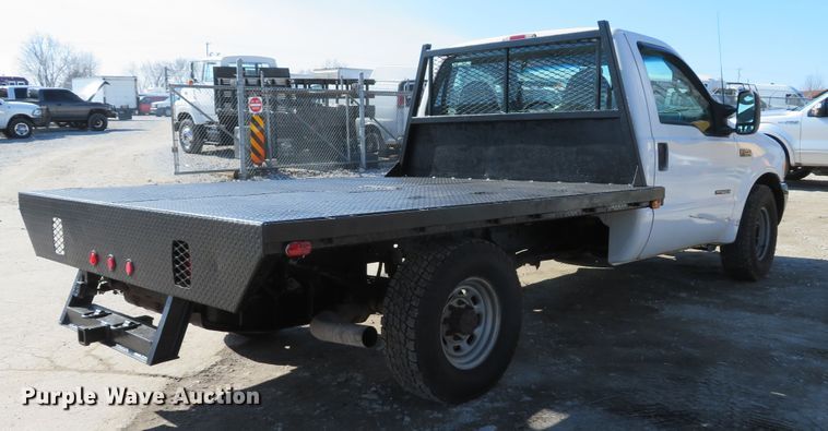 image for item DI2070 2000 Ford F350 Super Duty XL  flatbed pickup truck