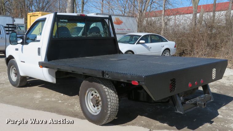 image for item DI2070 2000 Ford F350 Super Duty XL  flatbed pickup truck