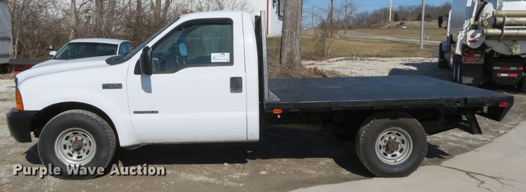 image for item DI2070 2000 Ford F350 Super Duty XL  flatbed pickup truck