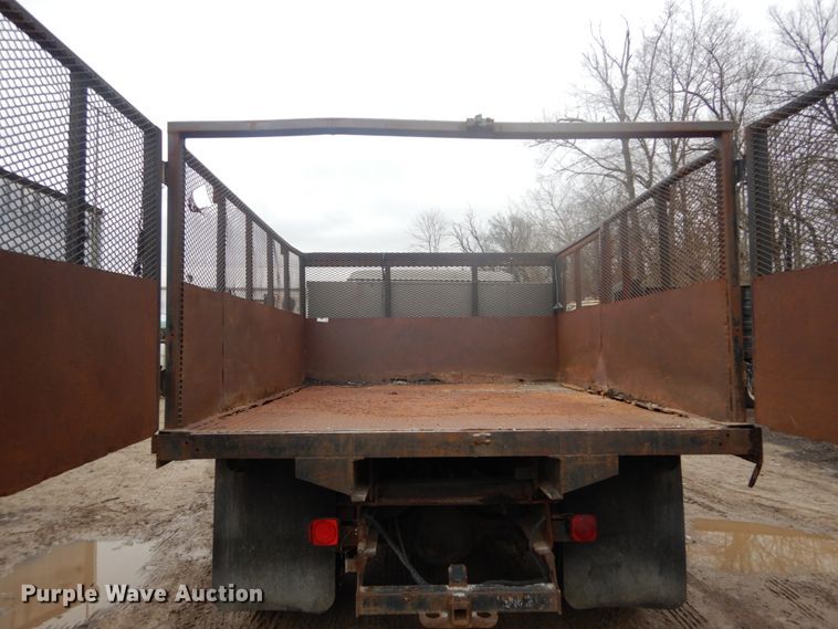 image for item GB9868 1999 International 4700 flat dump bed truck