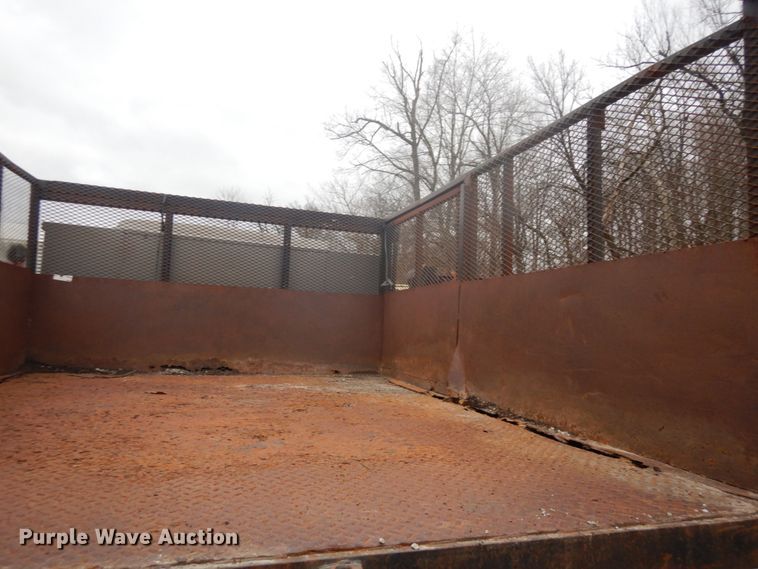 image for item GB9868 1999 International 4700 flat dump bed truck