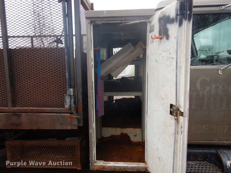 image for item GB9868 1999 International 4700 flat dump bed truck