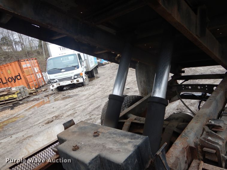 image for item GB9868 1999 International 4700 flat dump bed truck