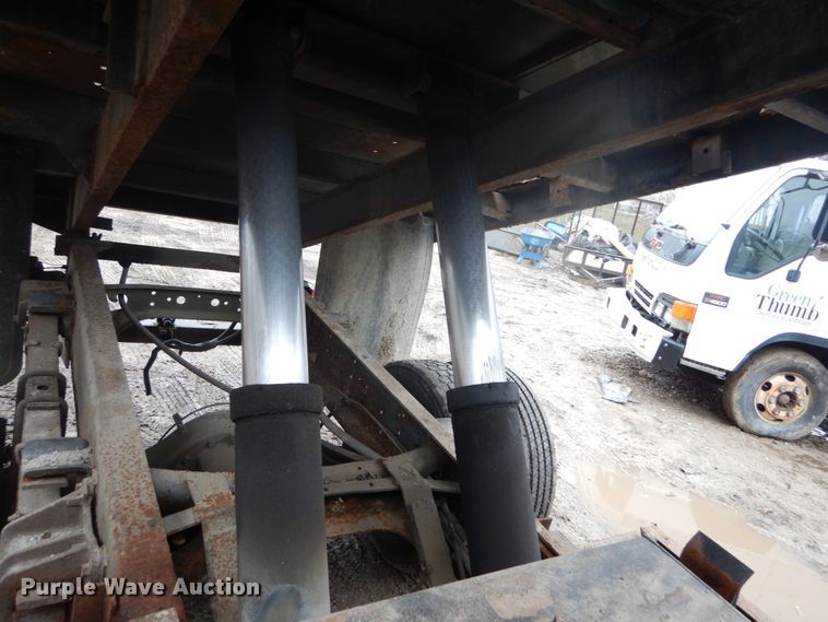 image for item GB9868 1999 International 4700 flat dump bed truck