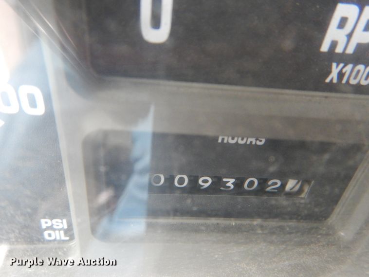 image for item GB9868 1999 International 4700 flat dump bed truck