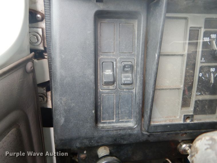 image for item GB9868 1999 International 4700 flat dump bed truck