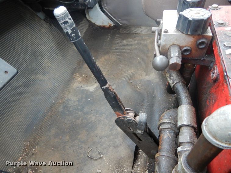 image for item GB9868 1999 International 4700 flat dump bed truck