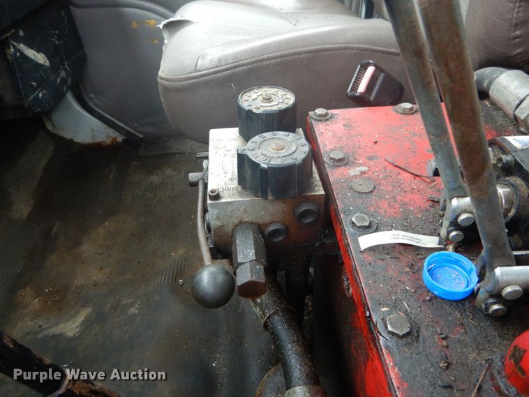 image for item GB9868 1999 International 4700 flat dump bed truck