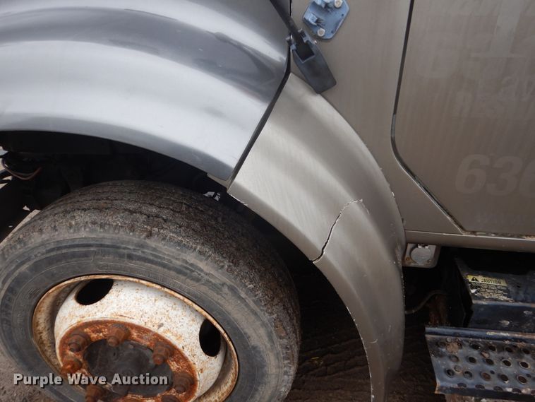 image for item GB9868 1999 International 4700 flat dump bed truck