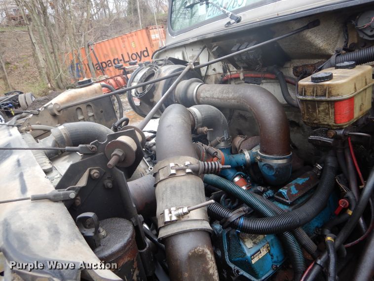 image for item GB9868 1999 International 4700 flat dump bed truck