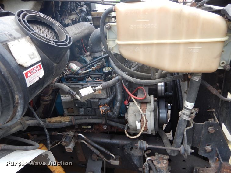 image for item GB9868 1999 International 4700 flat dump bed truck