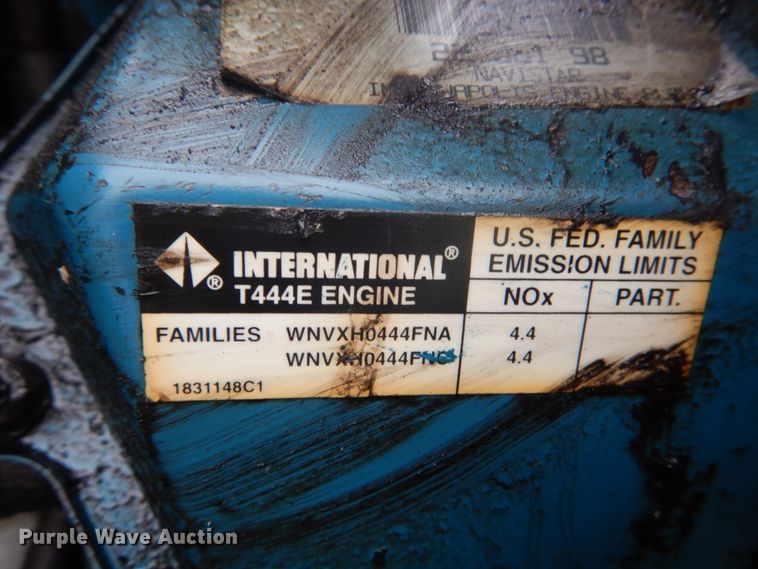 image for item GB9868 1999 International 4700 flat dump bed truck