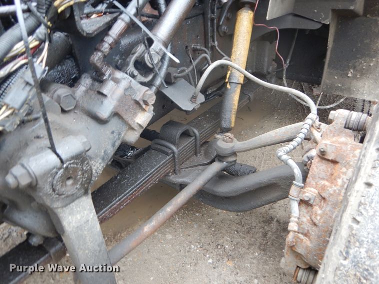 image for item GB9868 1999 International 4700 flat dump bed truck