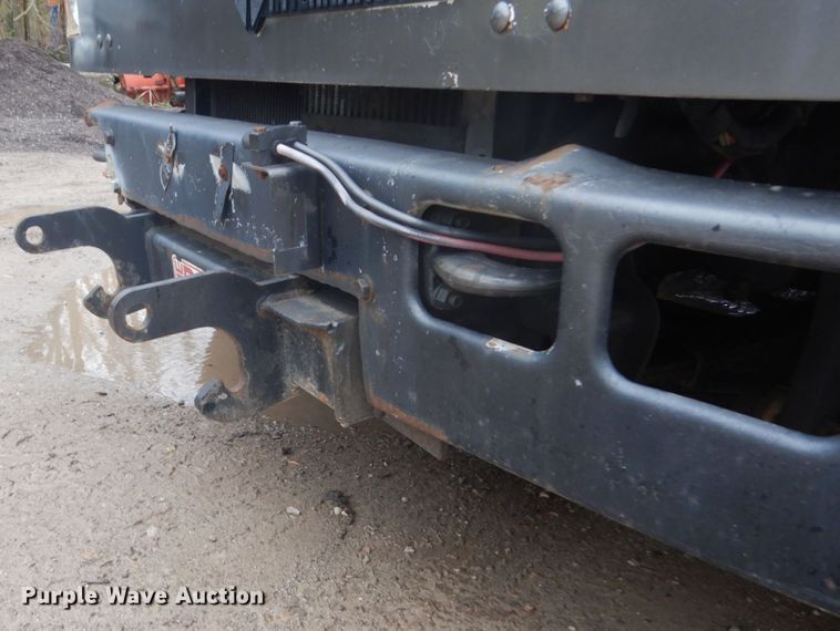 image for item GB9868 1999 International 4700 flat dump bed truck