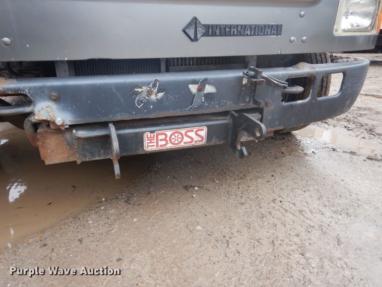 image for item GB9868 1999 International 4700 flat dump bed truck