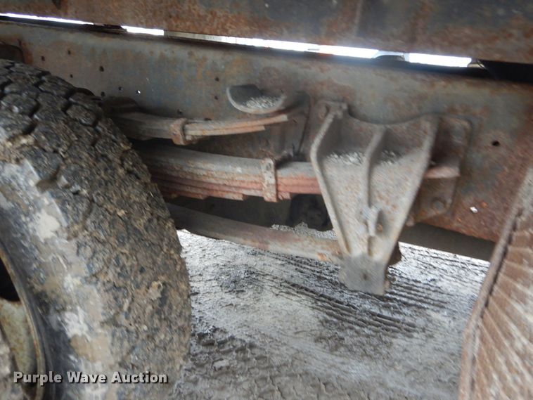 image for item GB9868 1999 International 4700 flat dump bed truck