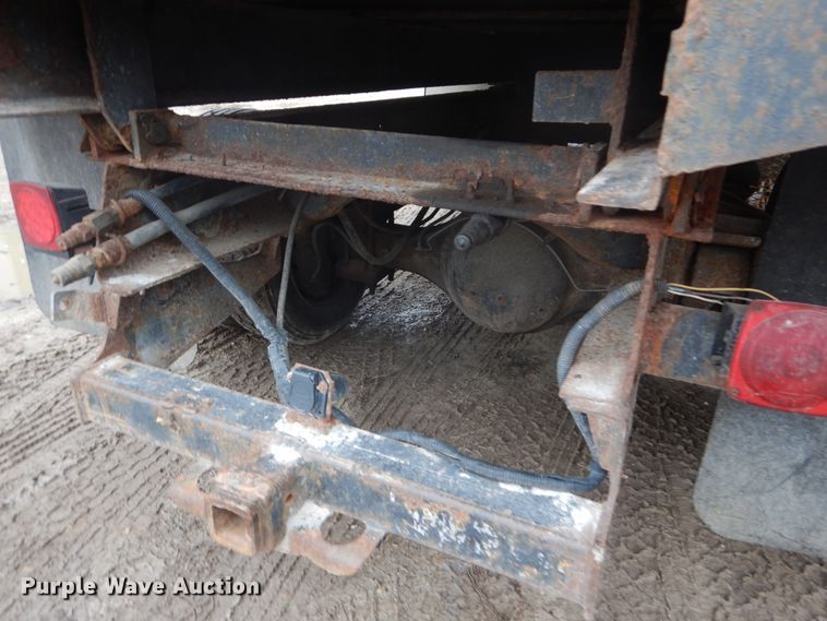 image for item GB9868 1999 International 4700 flat dump bed truck