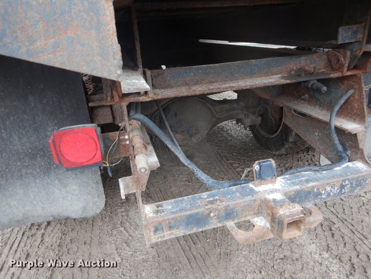 image for item GB9868 1999 International 4700 flat dump bed truck