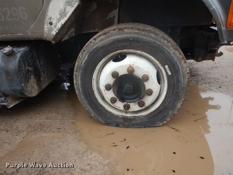 image for item GB9868 1999 International 4700 flat dump bed truck