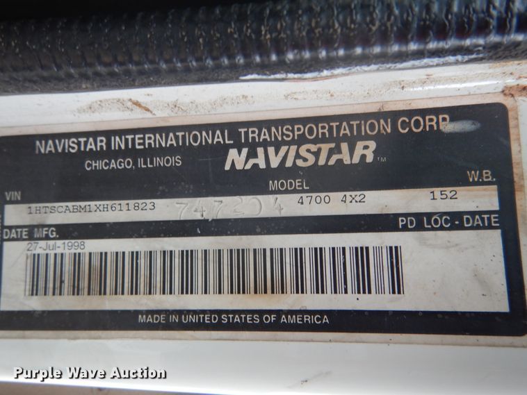 image for item GB9868 1999 International 4700 flat dump bed truck